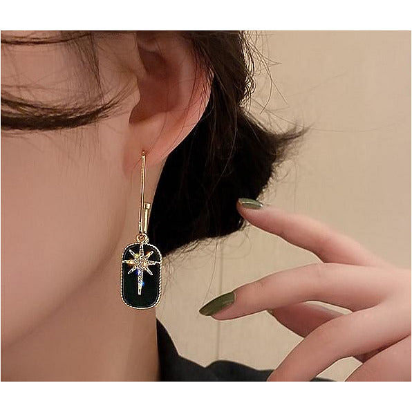 Black Star Drop Earring.
