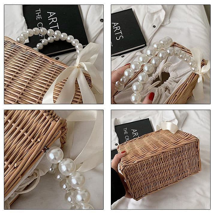 Luxury Pearl Handle Straw Bag.