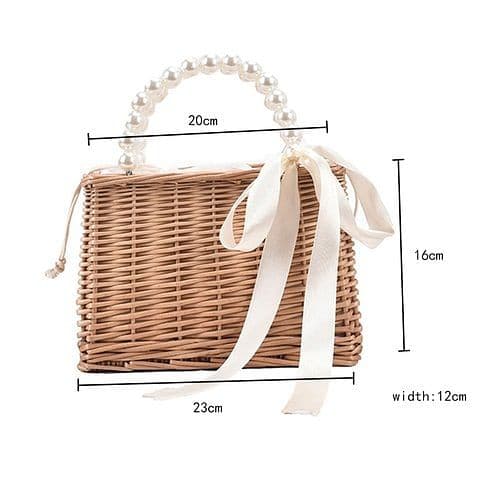 Luxury Pearl Handle Straw Bag.