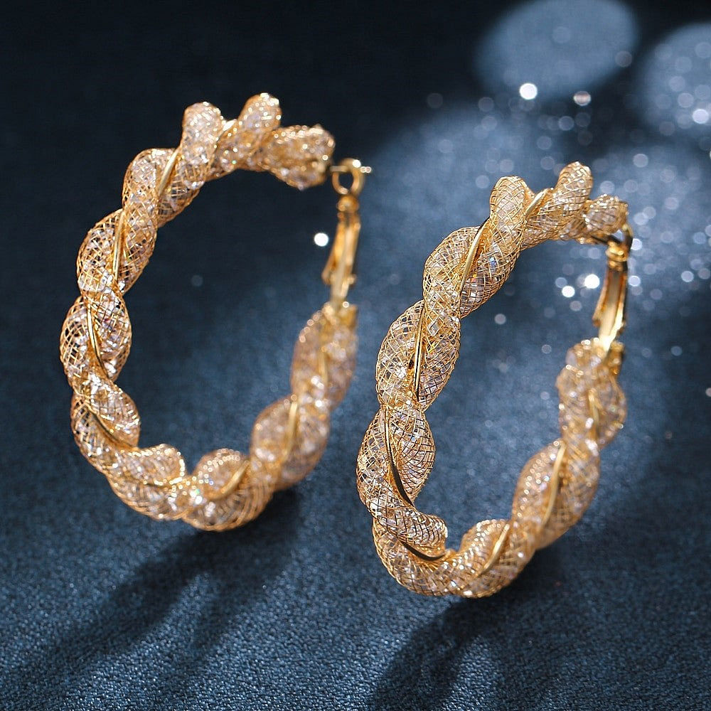 Gold Hoop Twist Earrings.